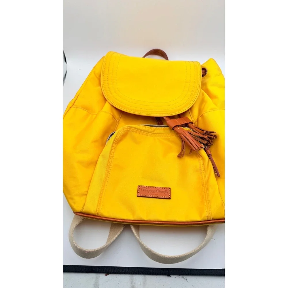 Dooney & Bourke Nylon Murphy Backpack Flap Tassel Drawstring Womens Yellow
